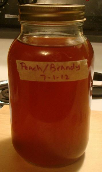 File:Peach liqueur.jpg